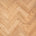 Close-up of a wooden floor with herringbone pattern
